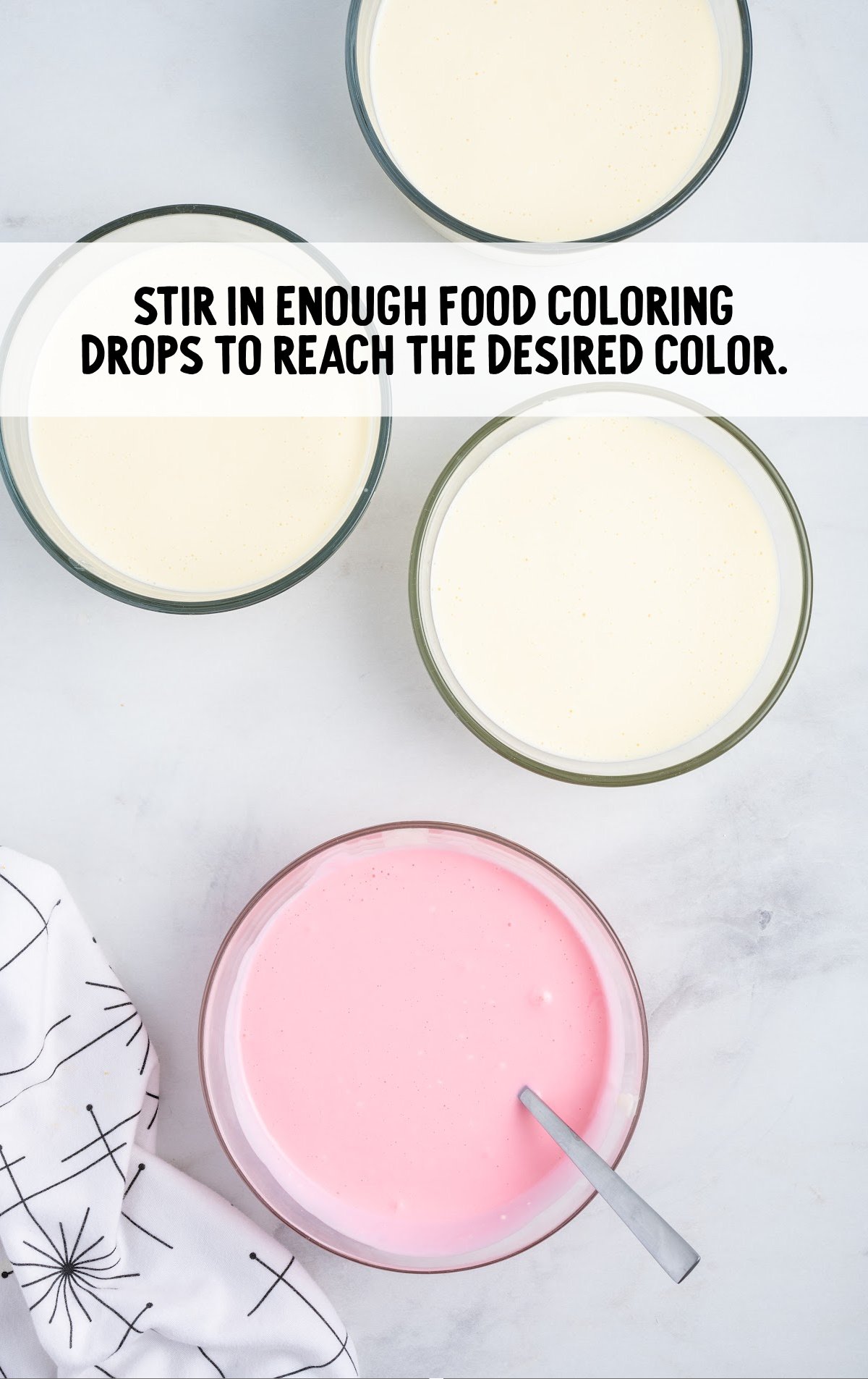 The cheesecake batter is dyed using the food colors. 