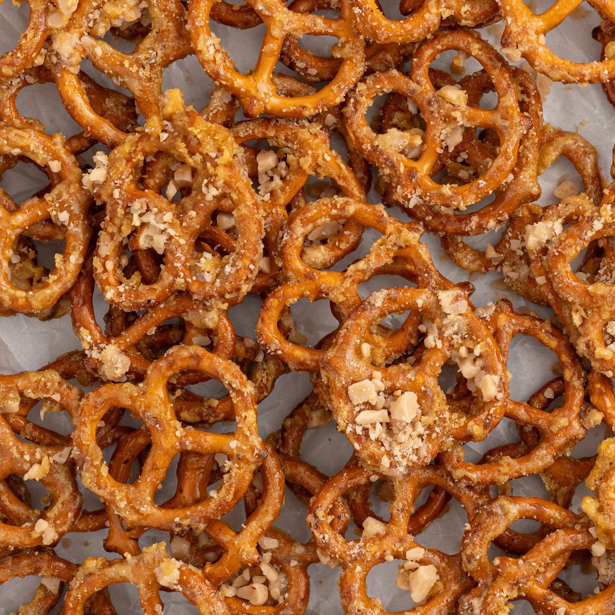 a bunch of Butter Toffee Pretzels on a baking sheet