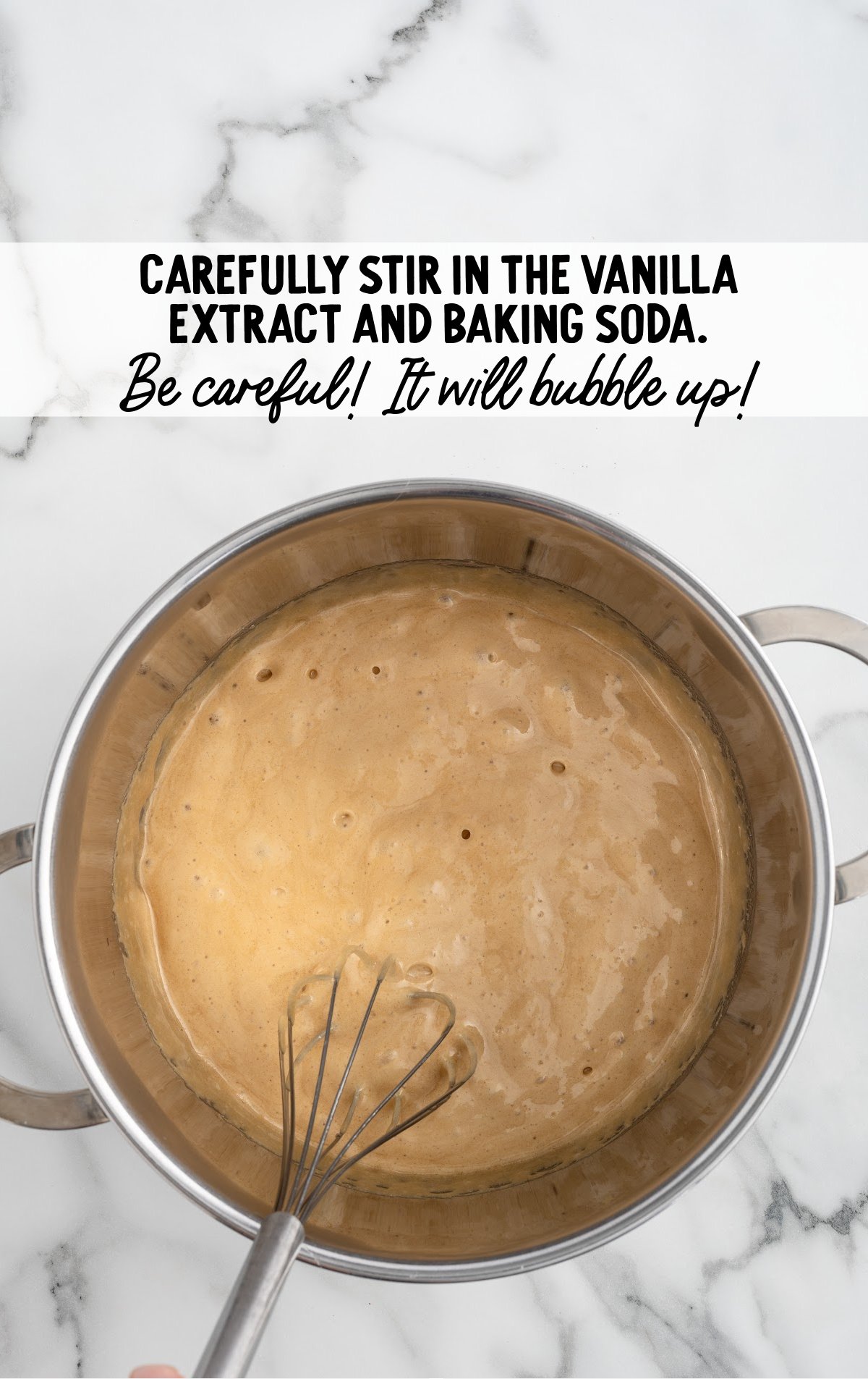 vanilla extract and baking soda whisked together in a bowl