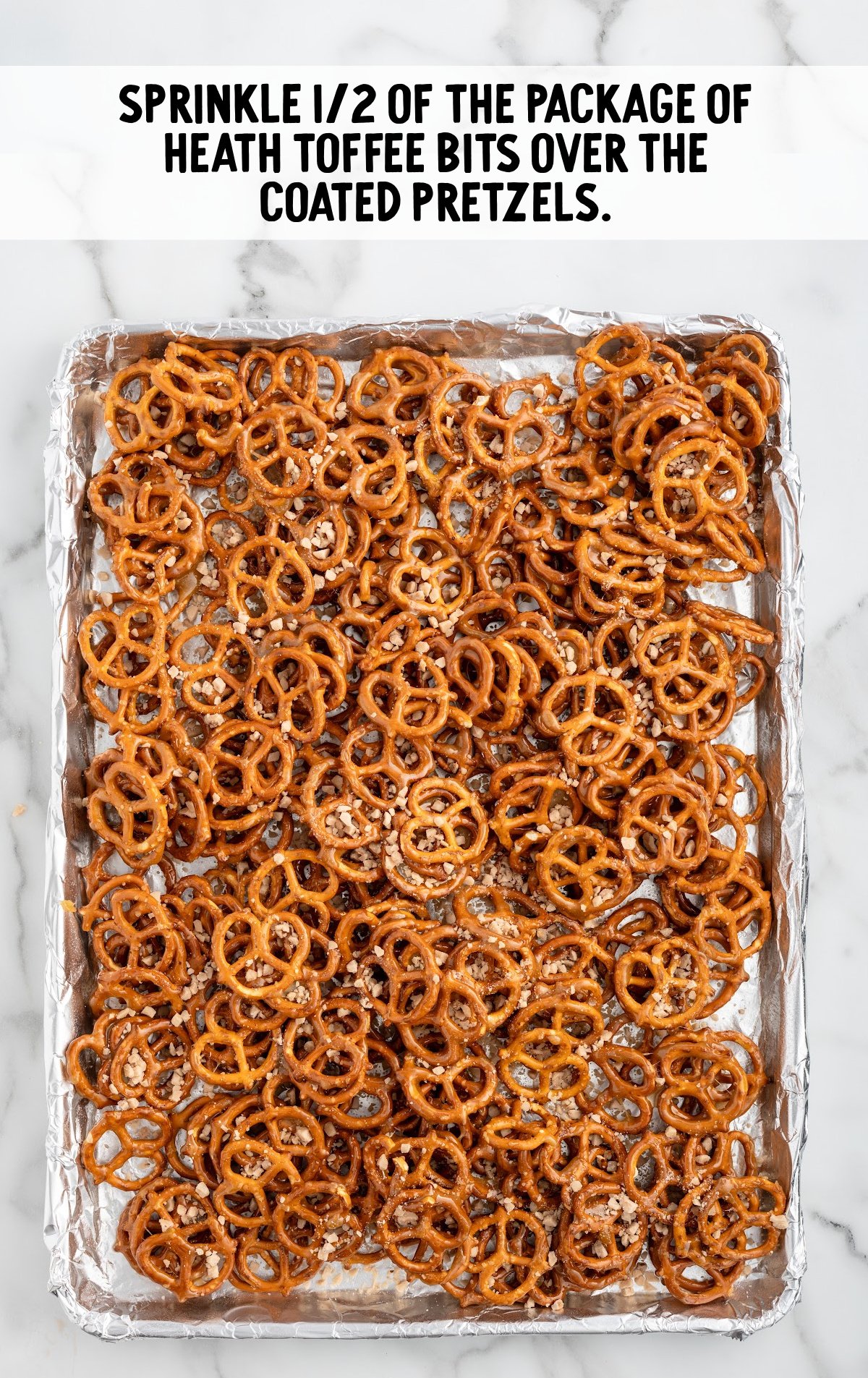 toffee bits sprinkled on top of the pretzels