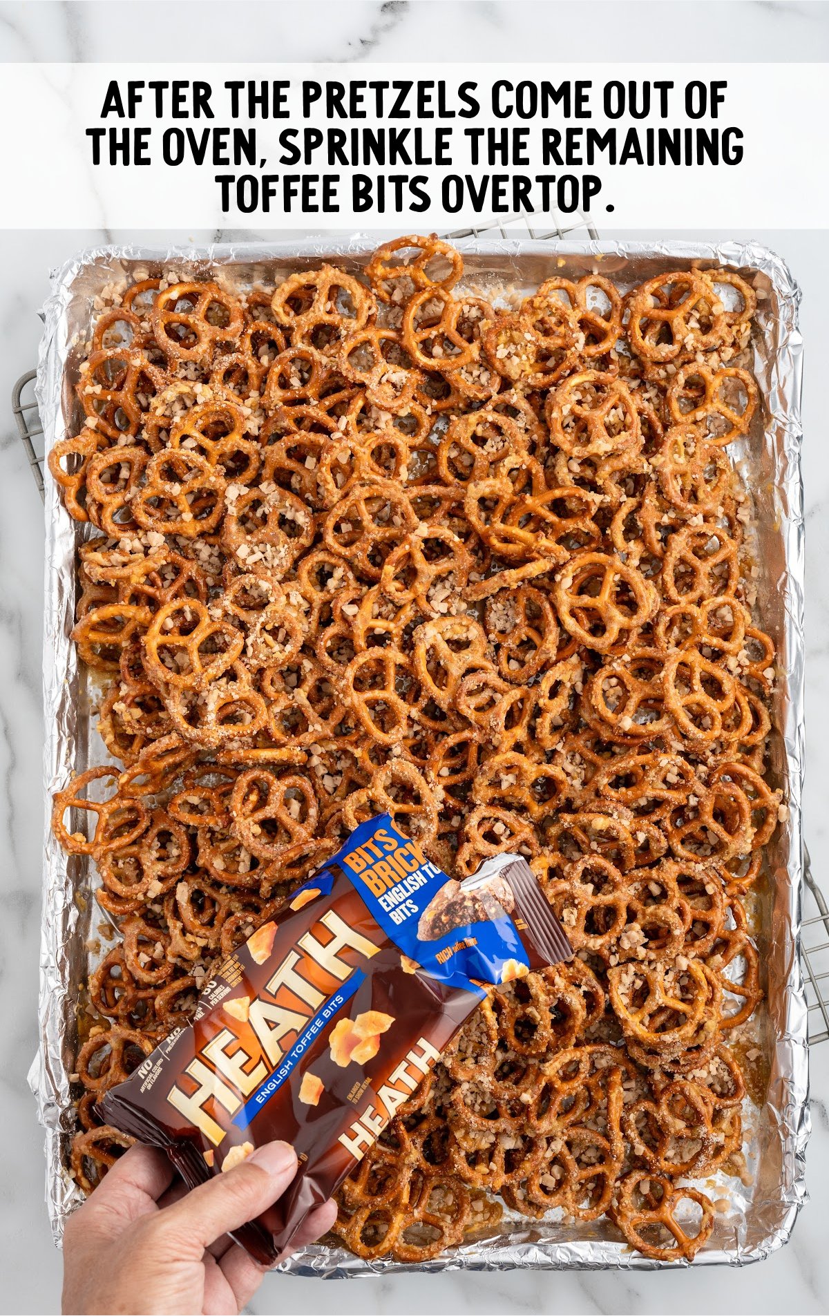 toffee bits sprinkled on top of the pretzels