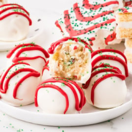 a bunch of Little Debbie Christmas Tree Cake Balls on a plate