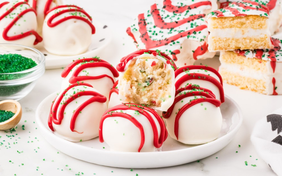 a bunch of Little Debbie Christmas Tree Cake Balls on a plate