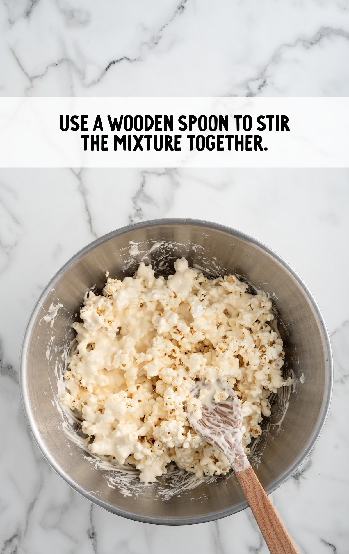 popcorn mixture stirred together in a bowl