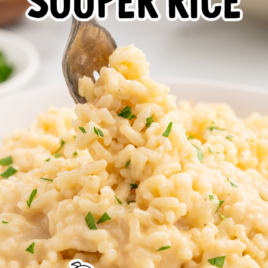 a plate of souper rice garnished with parsley