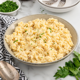 a pot of souper rice garnished with parsley