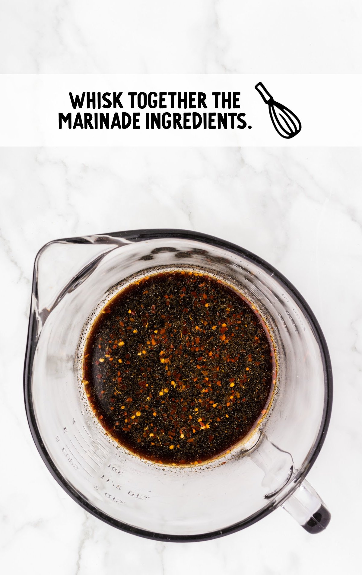 marinade ingredients combined in a measuring cup