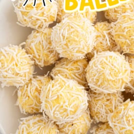 a bunch of pineapple balls on a plate