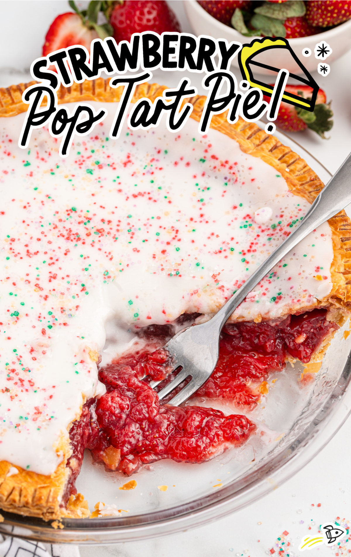 A strawberry pop tart pie in a pie plate with a few pieces missing. The filling is oozing and there's a fork in the pie plate.