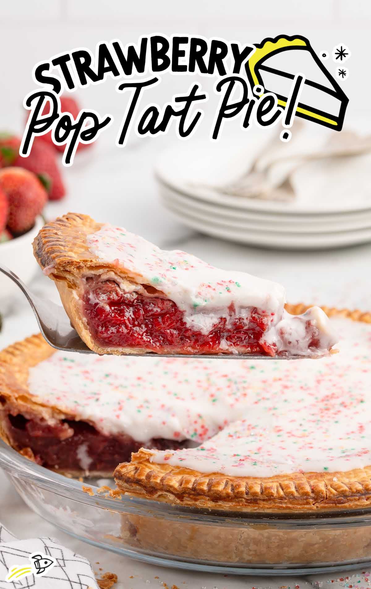 a slice of Strawberry Pop Tart Pie taken out of the whole pie