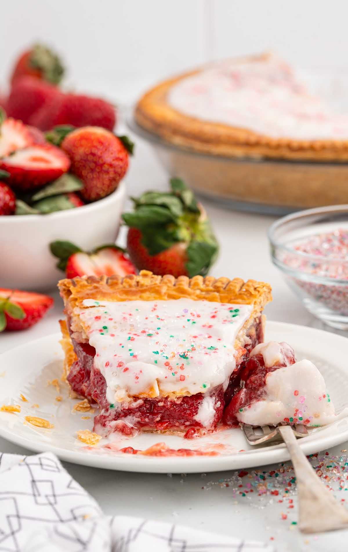 a slice of Strawberry Pop Tart Pie on a plate