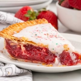 a slice of Strawberry Pop Tart Pie on a plate