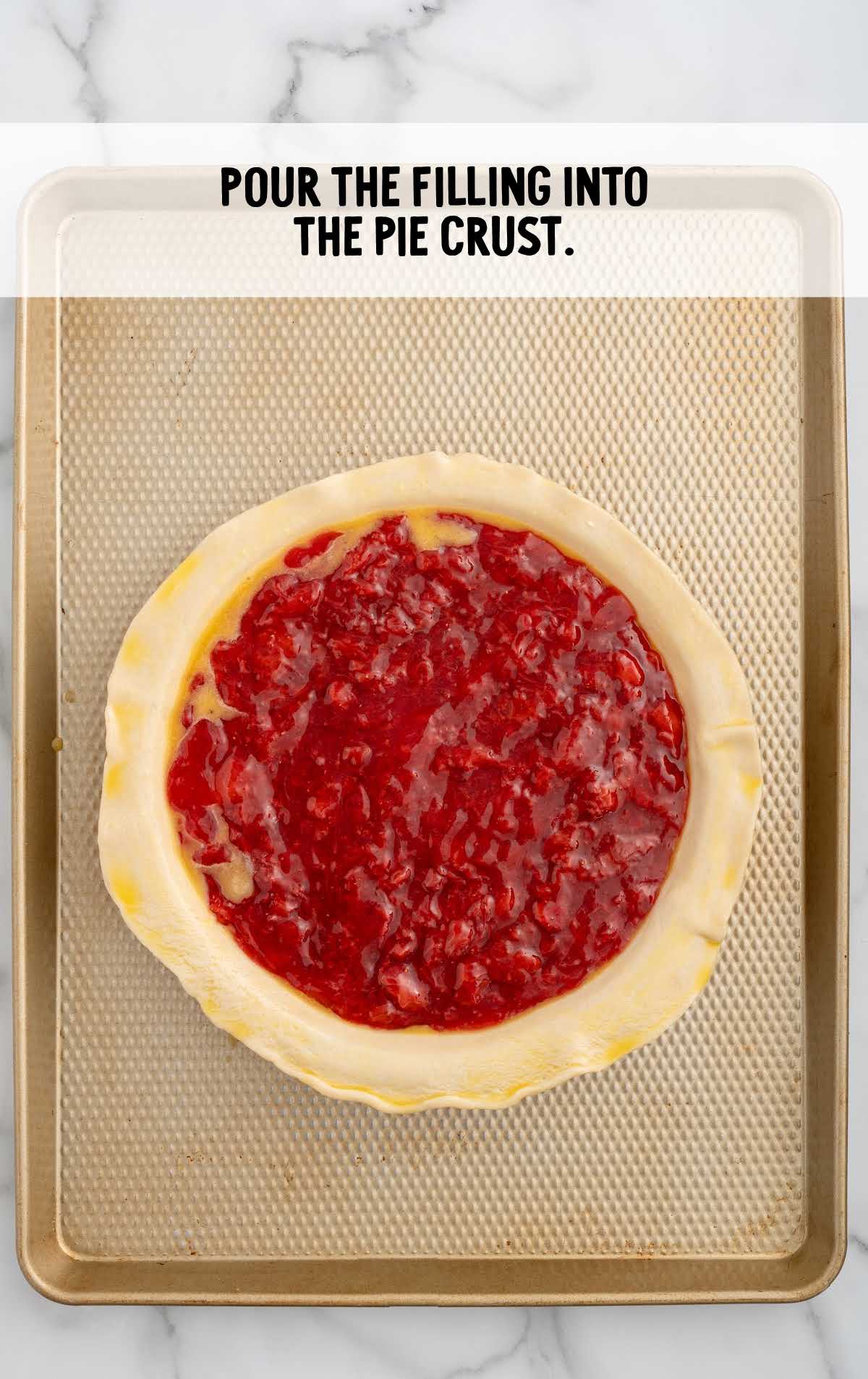 strawberry filling spread on top of the pie crust