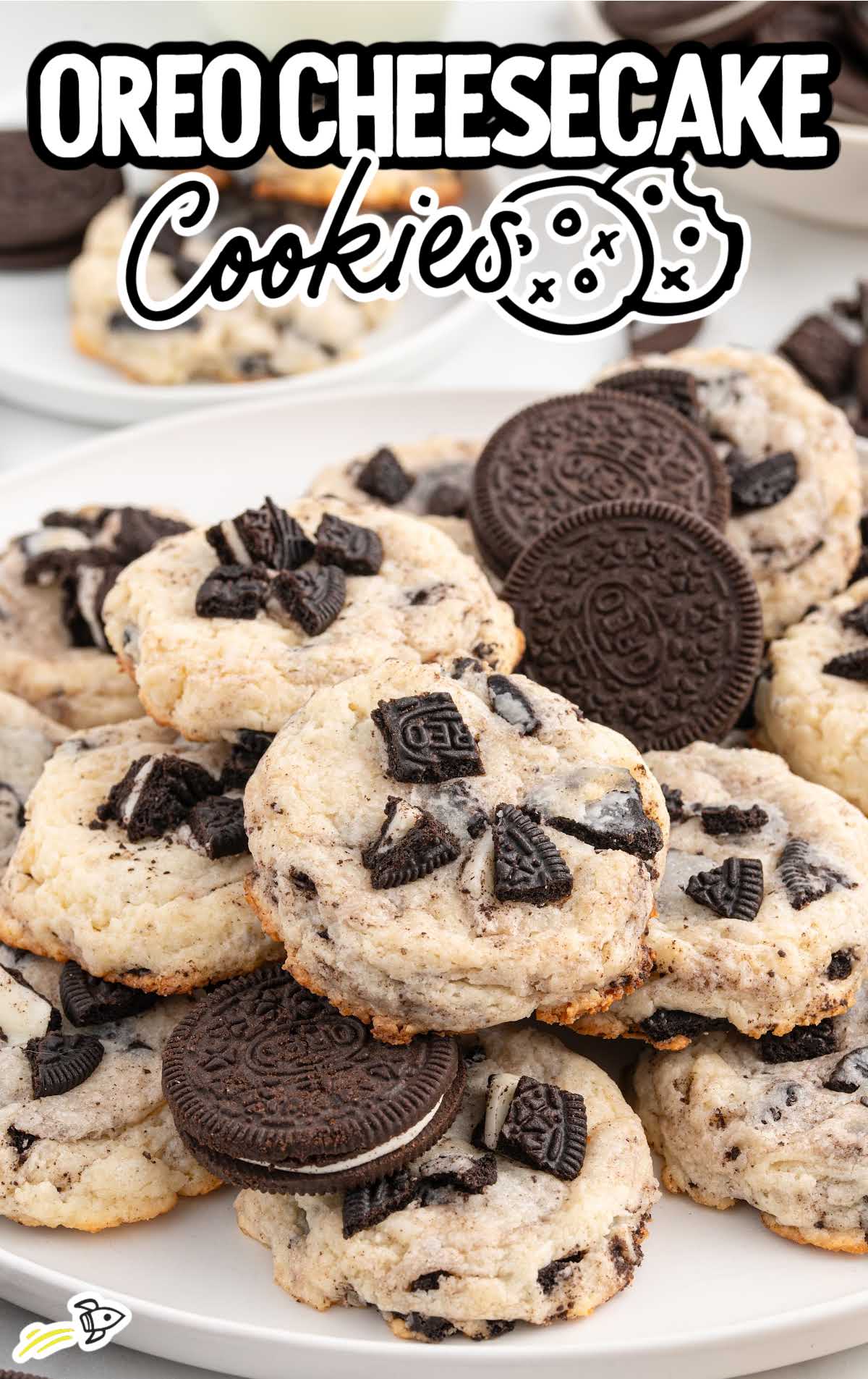 a bunch of oreo cheesecake cookies with oreos on a plate