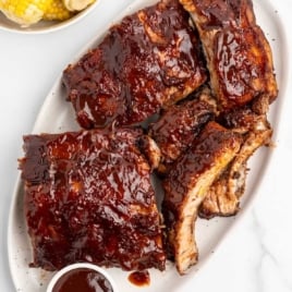 Slow cooker BBQ baby back ribs cooked until fall off the bone and finished with a sticky barbecue glaze