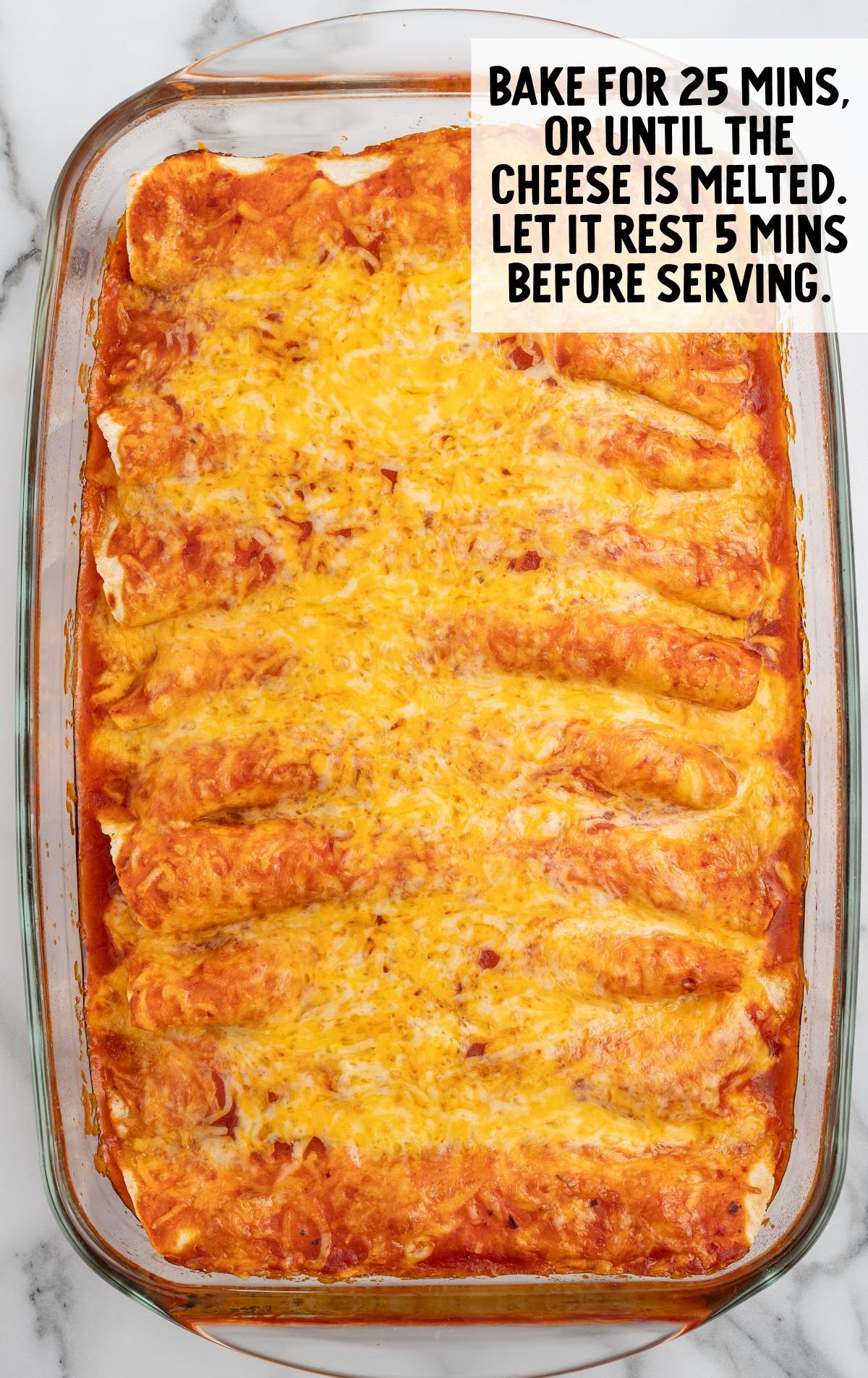 cream cheese chicken enchiladas baked in a baking dish