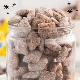 Jar filled with vintage Butterfinger muddy buddies, labeled as a perfect peanut butter and chocolate combo.