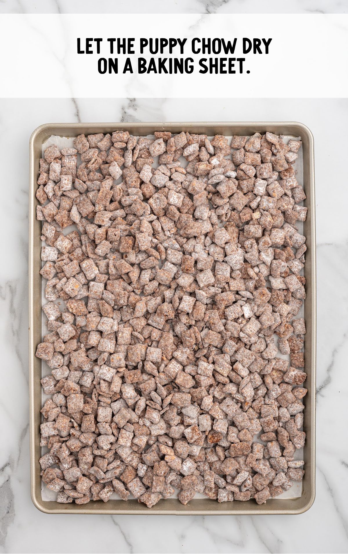 puppy chow drying on a baking sheet