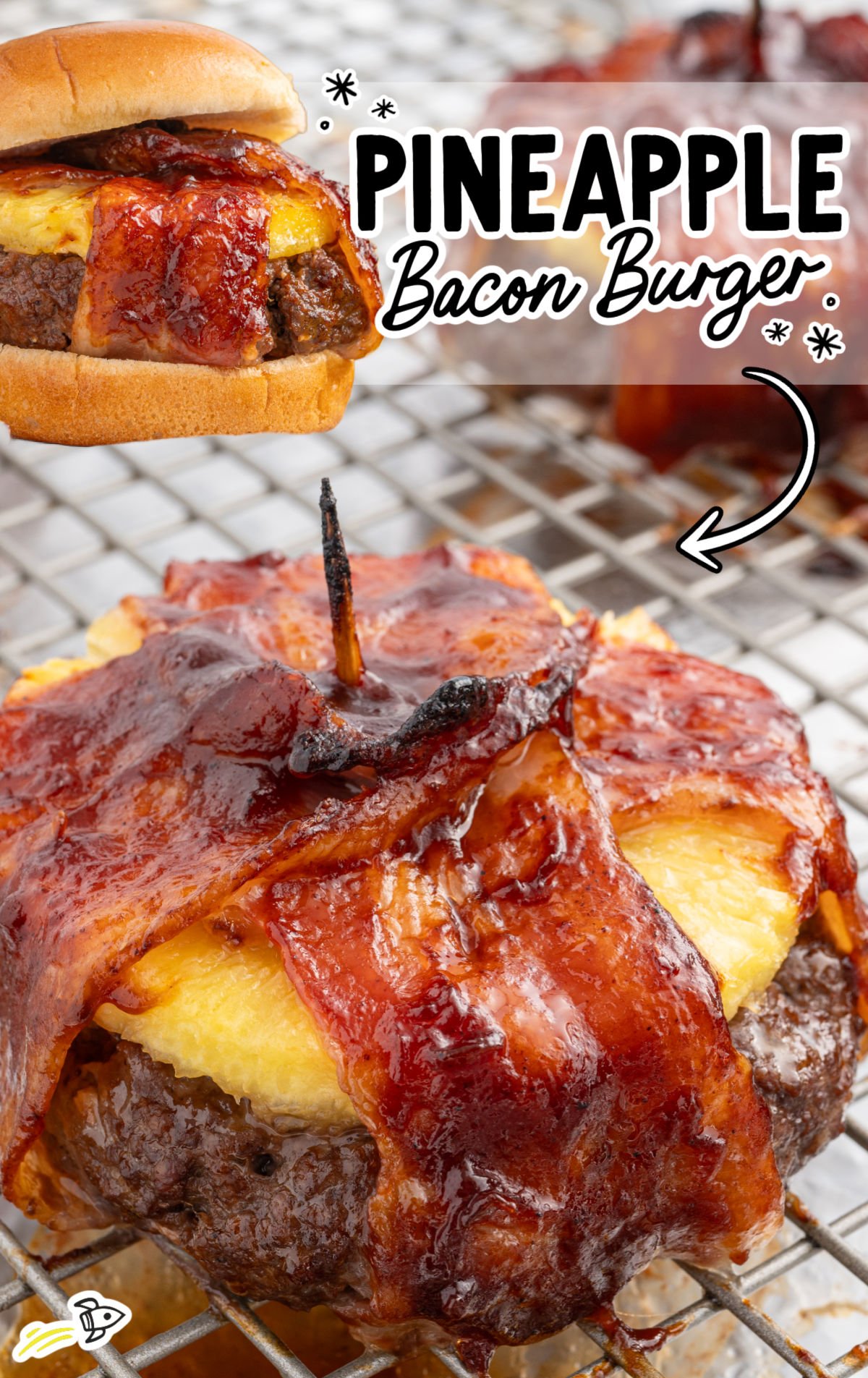 Close-up of a glazed pineapple bacon burger patty on a baking rack, wrapped in crispy bacon and topped with pineapple, with a graphic overlay reading "Pineapple Bacon Burger."