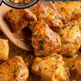Garlic butter chicken bites in a pan with text overlay for quick appetizer or dinner.