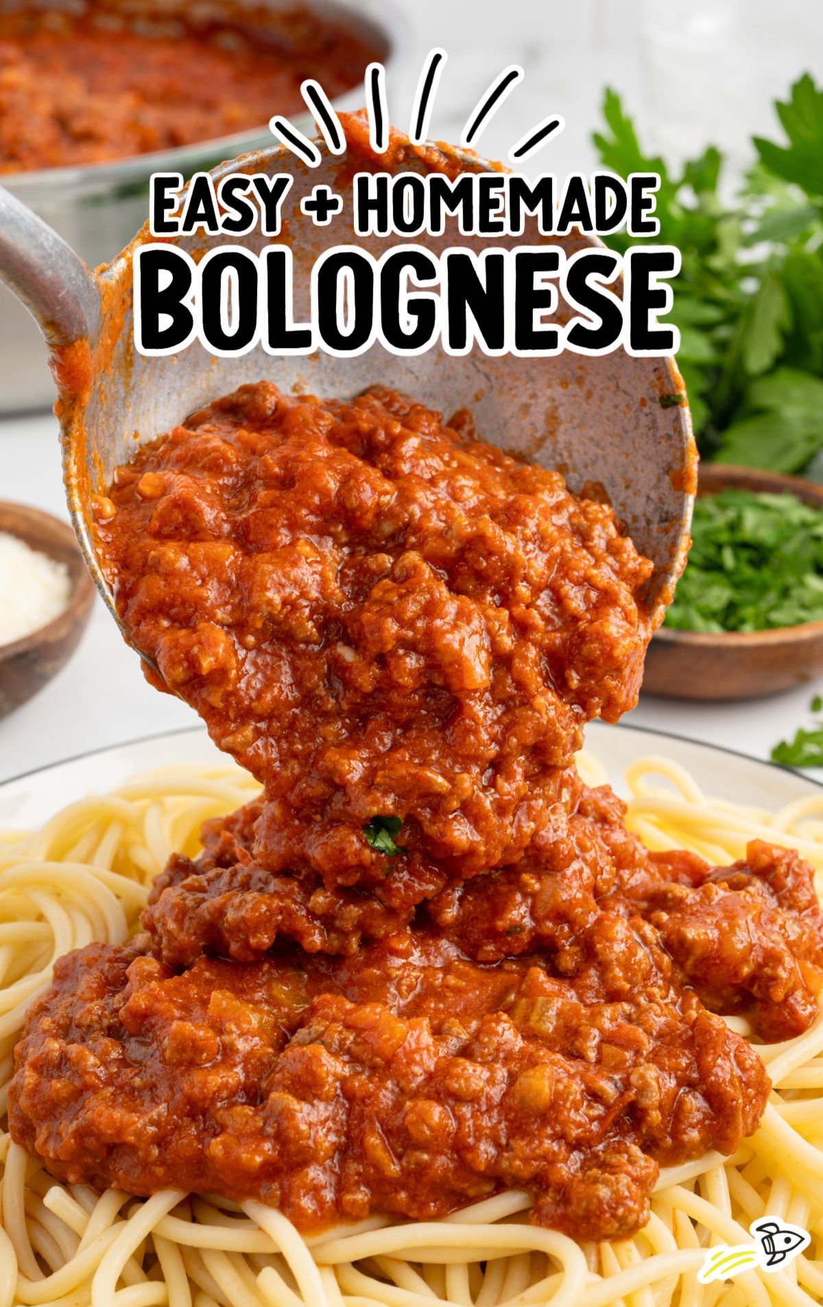 a plate of bolognese sauce on top of spaghetti
