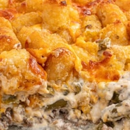 Tater tot casserole with ground beef in a baking dish with text overlay: “Tater Tot Casserole with Ground Beef – 15 Minutes & It's in the Oven!”