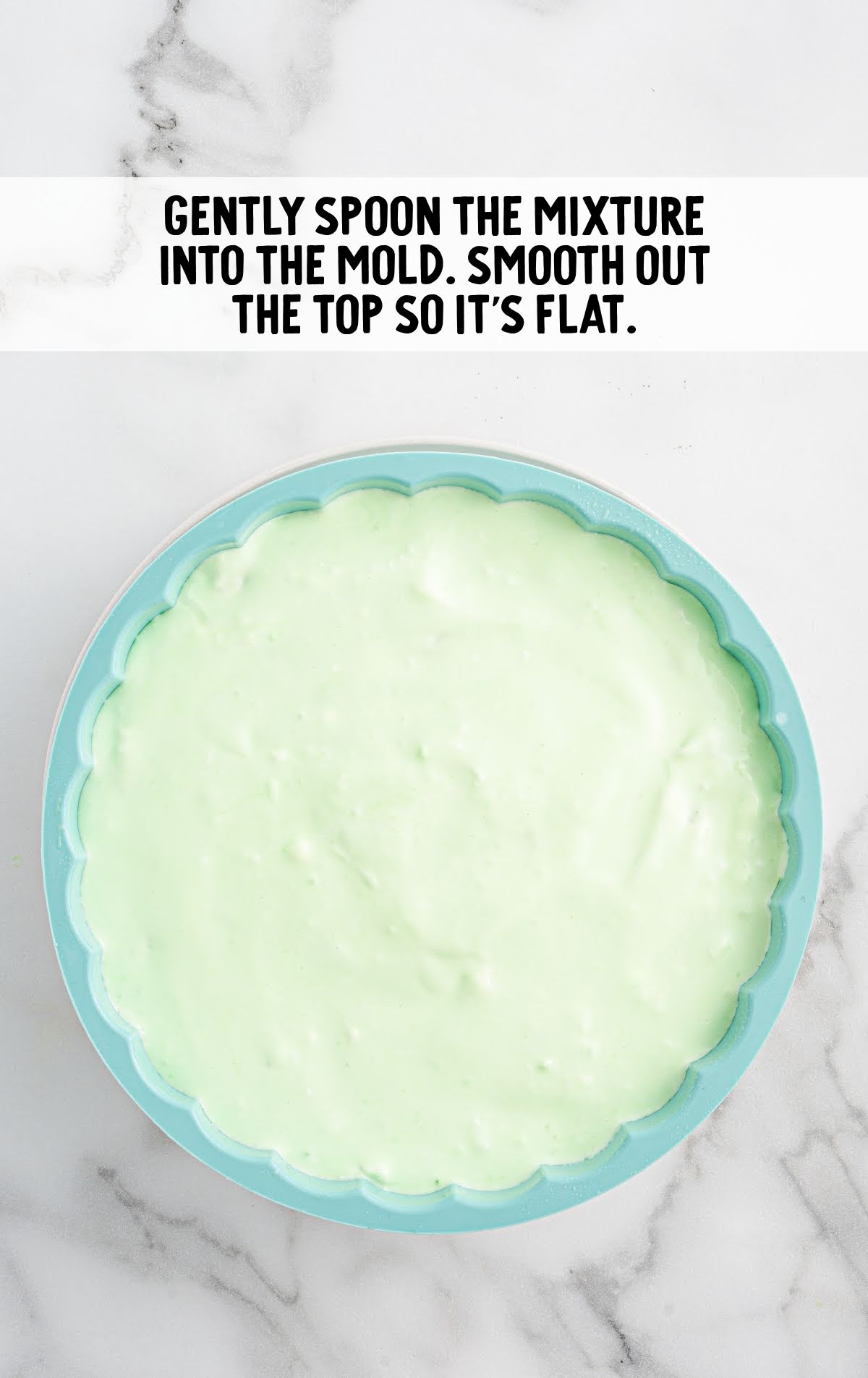 seafoam salad mixture spooned into the mold