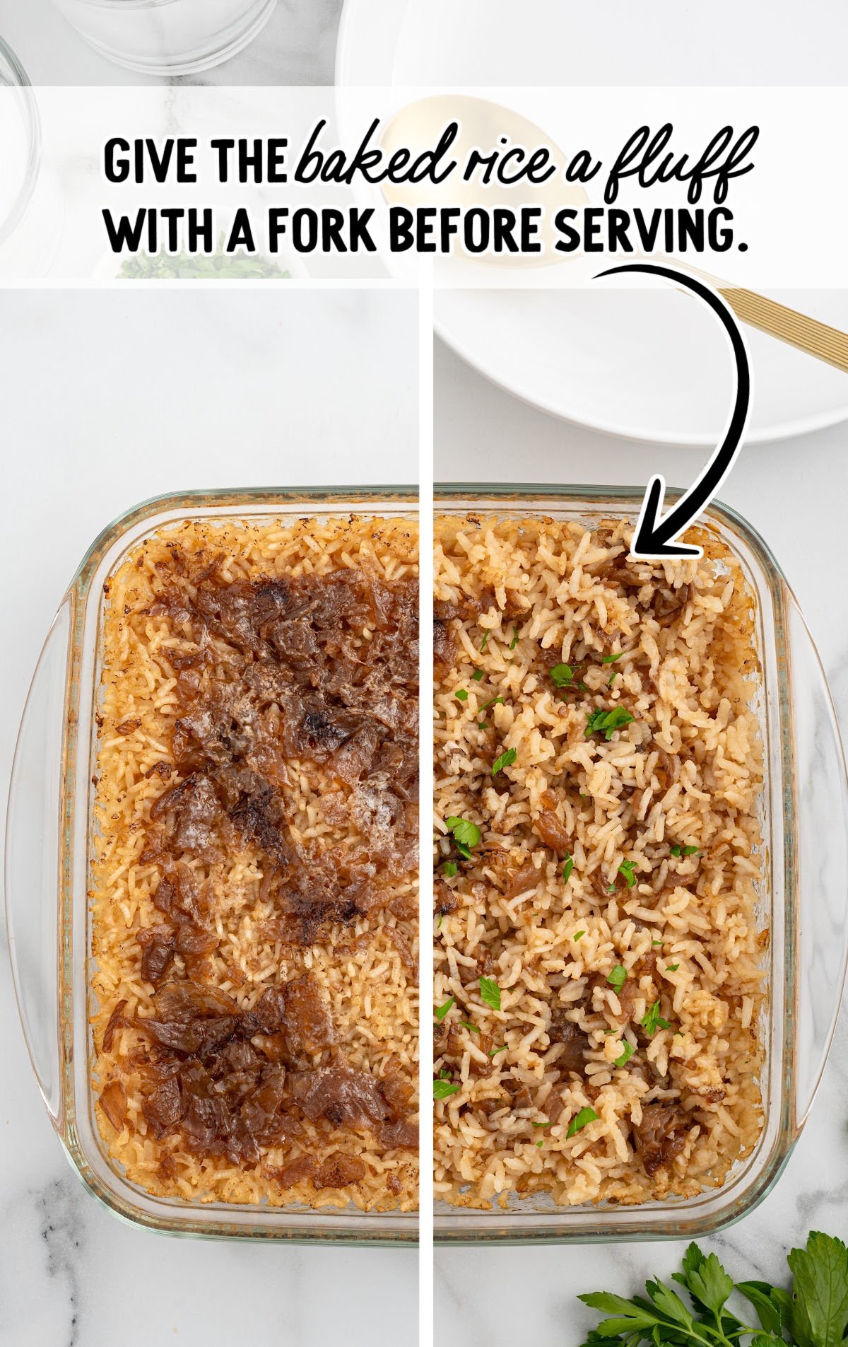 Baked French onion rice fluffed with a fork in a glass casserole dish.