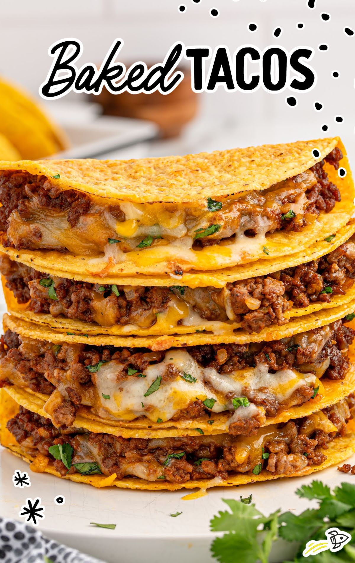 Crispy baked tacos loaded with cheesy ground beef filling, stacked neatly for an easy family meal.