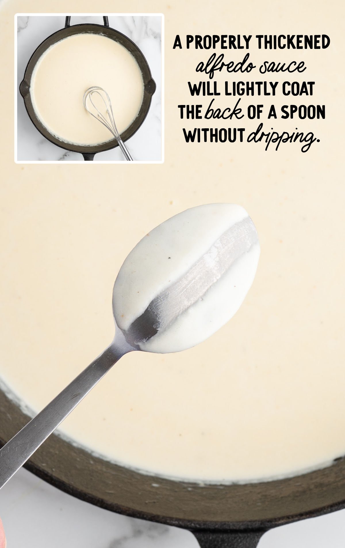 Creamy alfredo sauce coating the back of a spoon in a skillet
