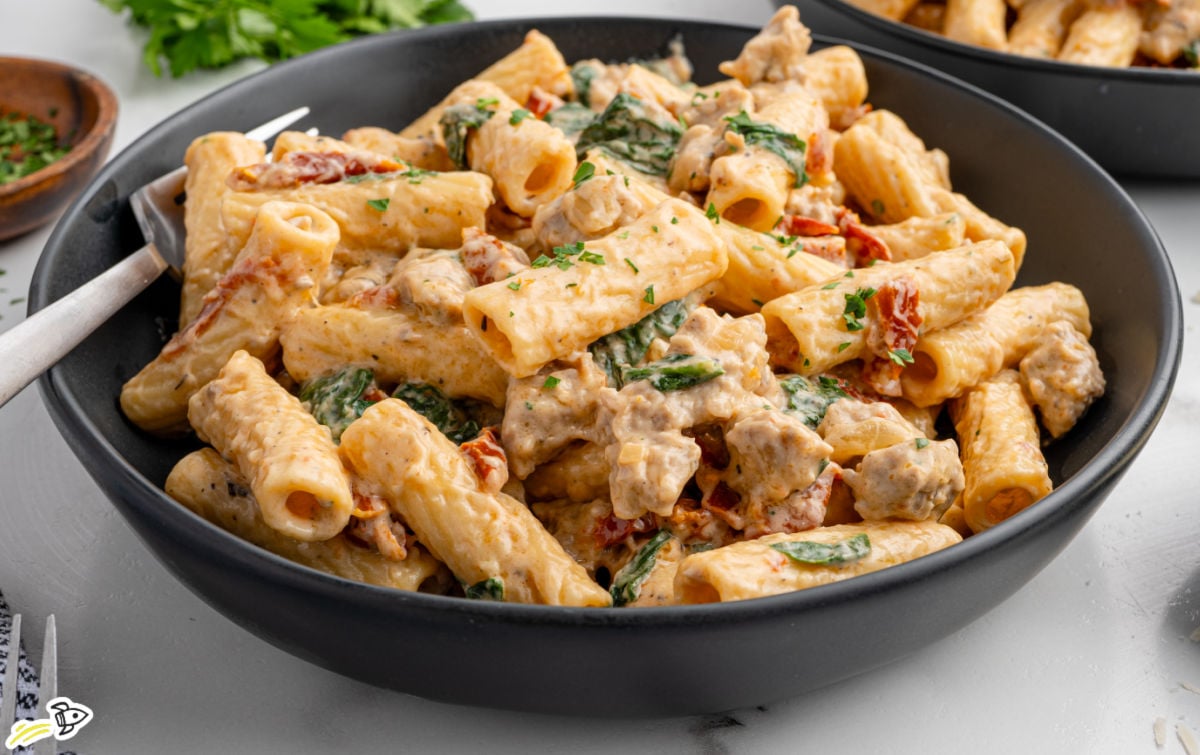 a bowl of creamy Italian sausage pasta
