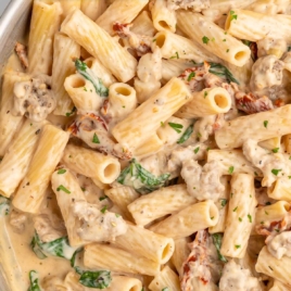 a skillet of creamy Italian sausage pasta