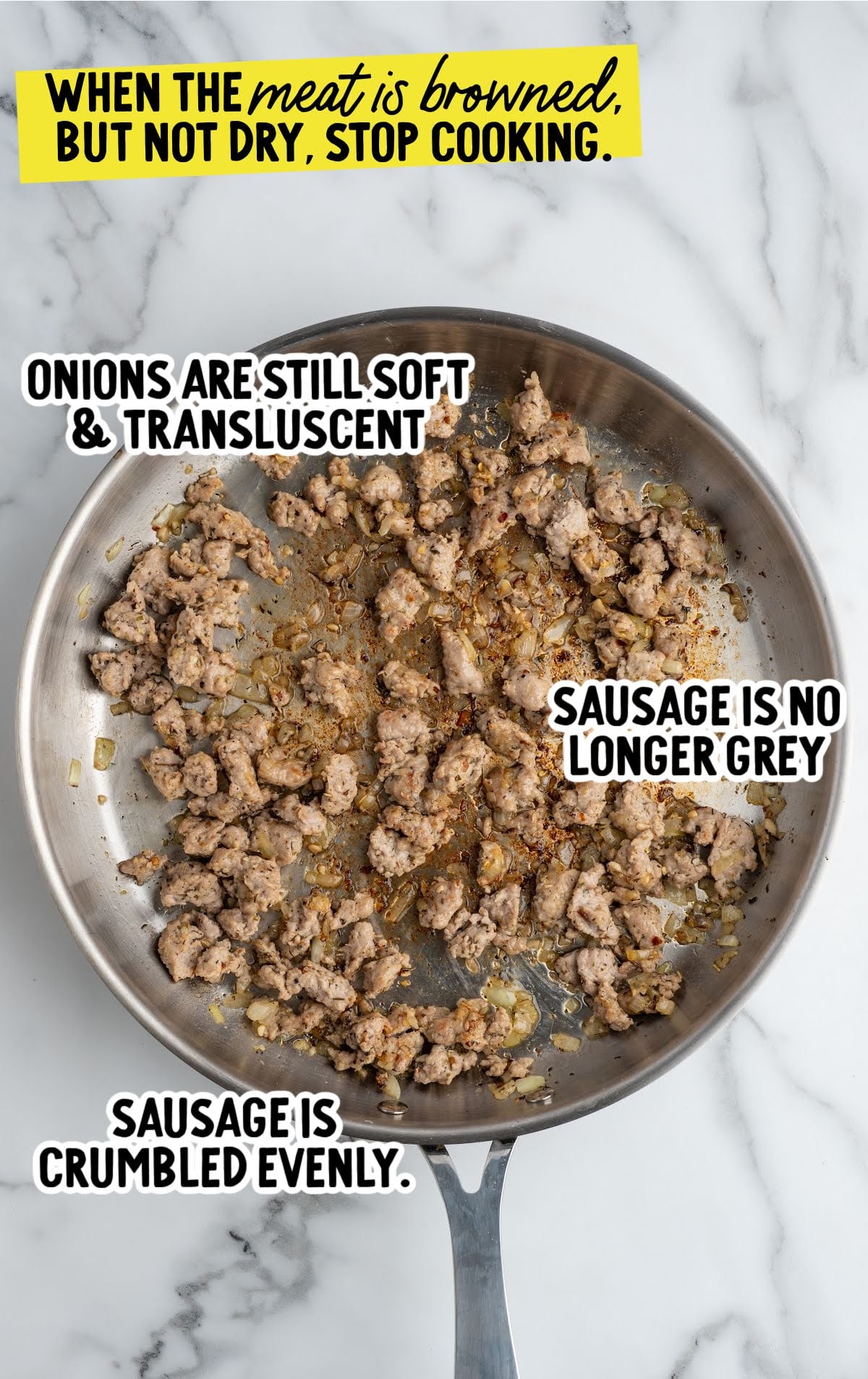 sausage being cooked in a skillet