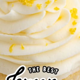 Close-up of Lemon Cupcakes with swirled frosting, lemon zest, and a lemon slice garnish. Bold text reads: “The Best Lemon Cupcakes” with “Vintage Recipe” below and an arrow highlighting the cupcake.