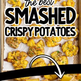 A baking sheet with crispy smashed potatoes, golden and sprinkled with herbs. Below, a close-up shows the texture and seasoning of the potatoes. Text reads: The Best Smashed Crispy Potatoes.